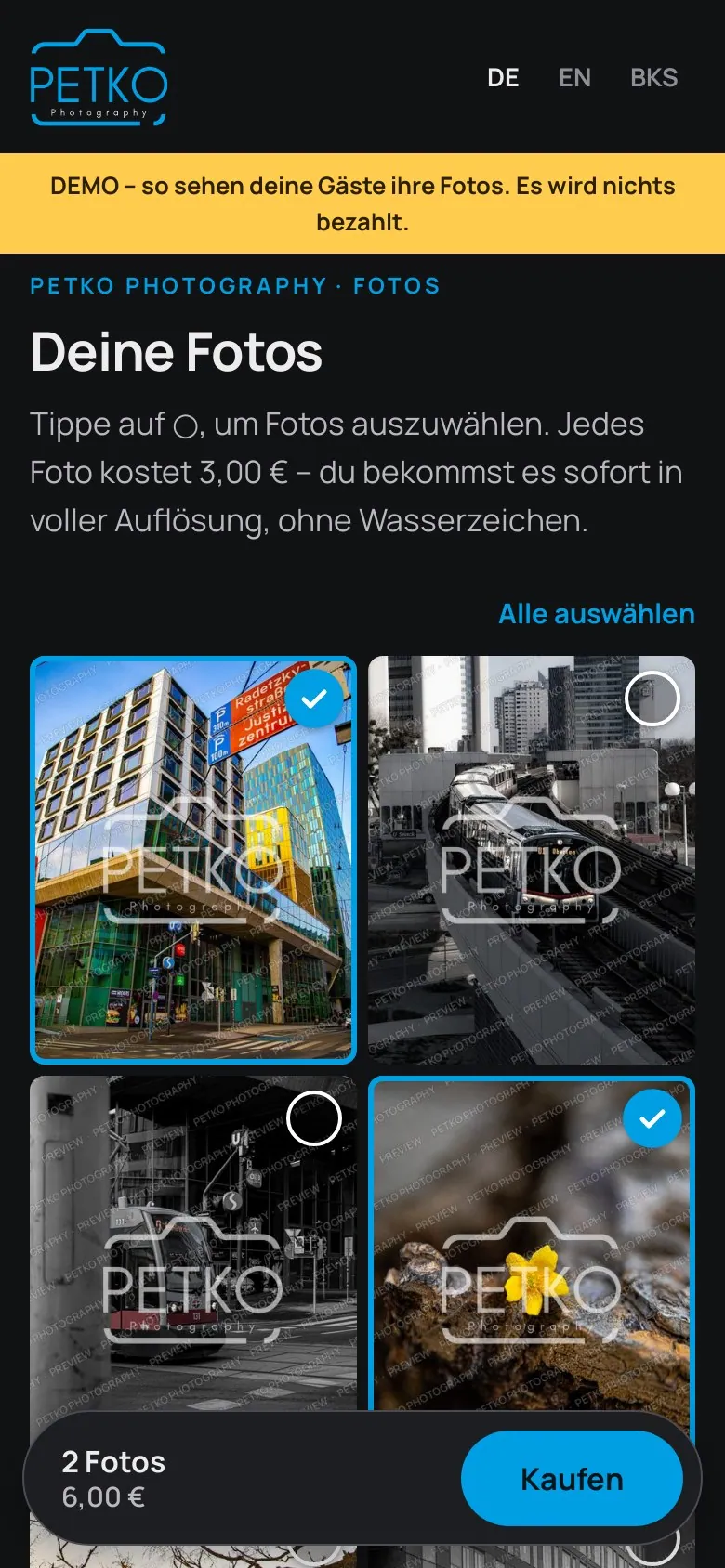 Handy mit der Live-Fotoseite: Wien-Fotos mit Wasserzeichen, zwei ausgewählt, unten „2 Fotos · 6,00 € – Kaufen“